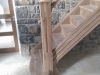 detailed walnut stairs and post with curved block